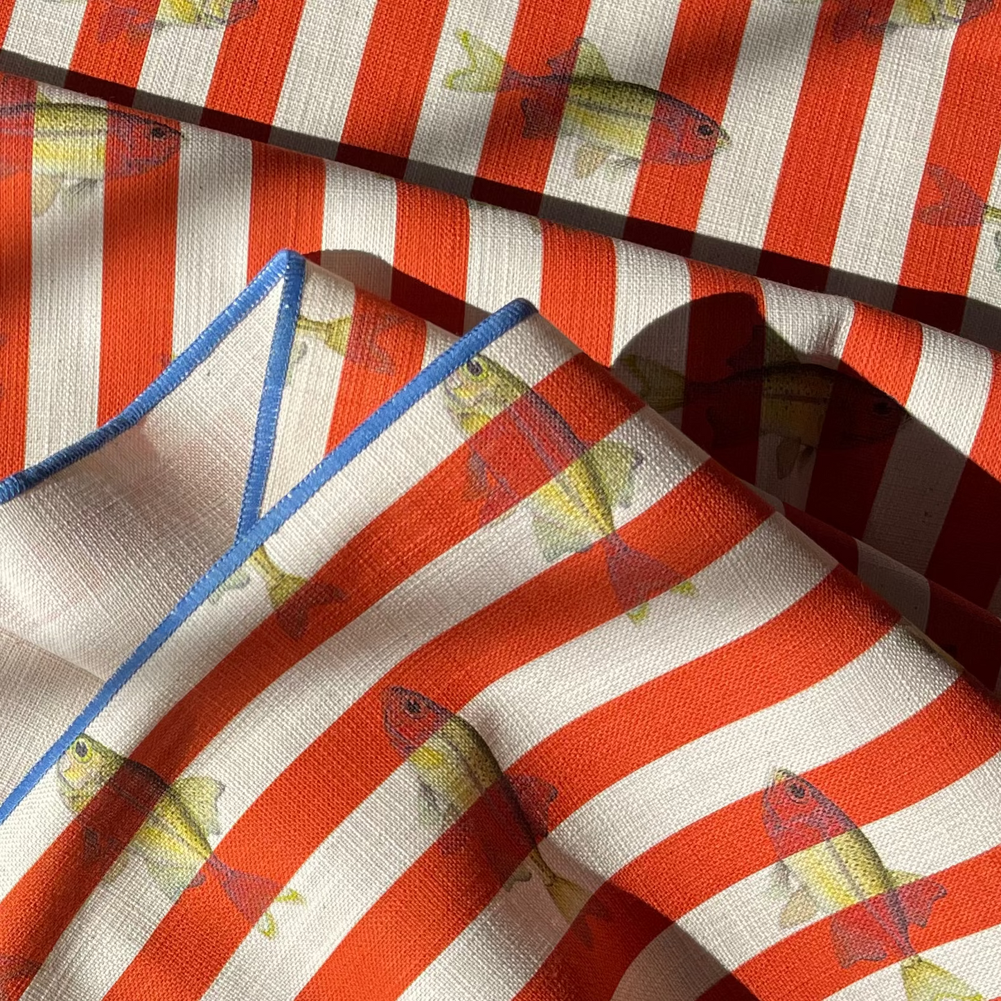 Orange Stripe with Fish pattern Fabric design by The Coocoo Club